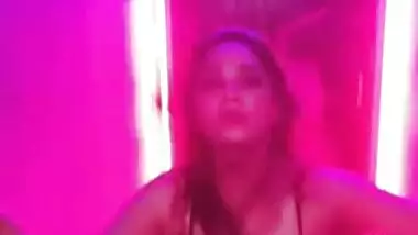 Enticing young woman reveals private parts posing in XXX lingerie