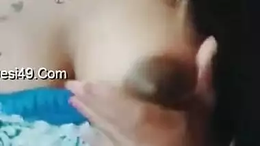 Busty Desi seductress XXX teases with her immense tits for the cam