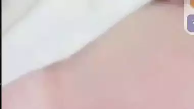 Smiling girlfriend video call to boyfriend shows boobs