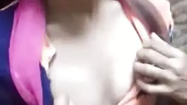 Adorable Desi cutie flashes curious friend her XXX tits in public