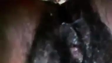 Malaysian Lady showing her dark pussy